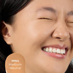 Close-up of a woman's face with MN4 shade 
