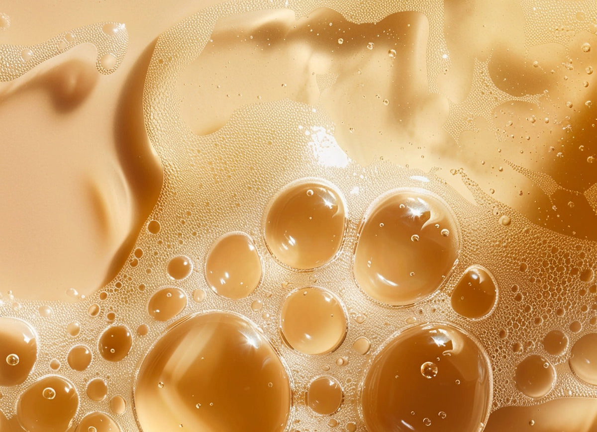 Close-up of brown liquid with bubbles of Encapsulated Retinol 