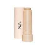 Creamy multitasking blush stick in You Go Pearl shade with beige packaging and cap.