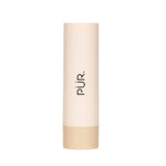 Beige cream blush stick with pür logo shown upright against white background